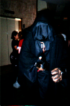 Oh yes, this guy...^_^** he was scary... very tall and evil-looking...you can't see it here, but he's actually drawing a sword.>:D yay swords!